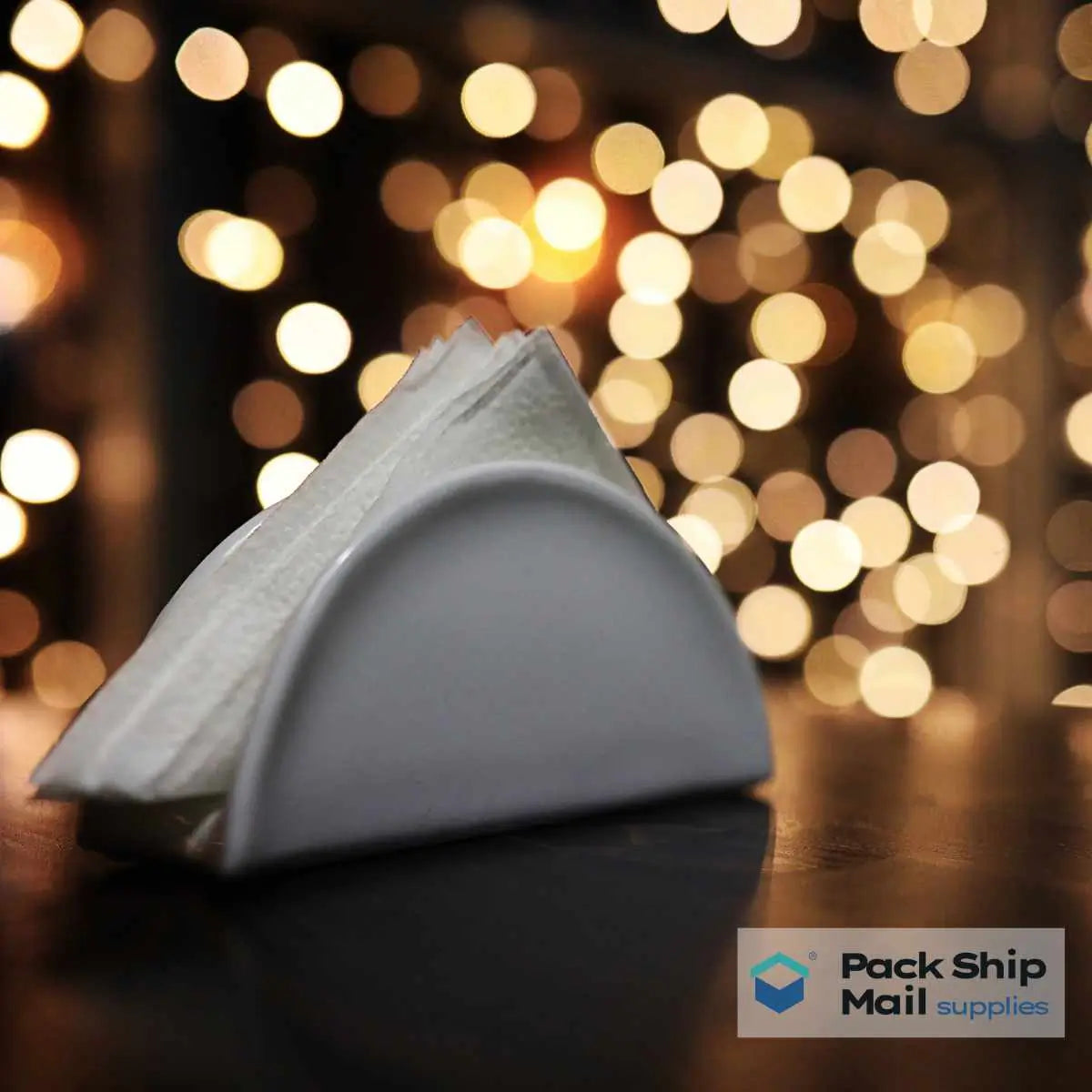 White dinner napkins, packaged in a case of 20 packs.